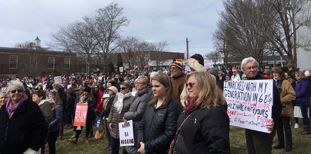 Crowd with signs